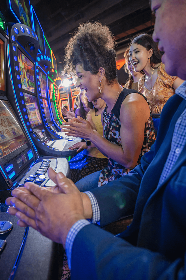 People playing slots having fun